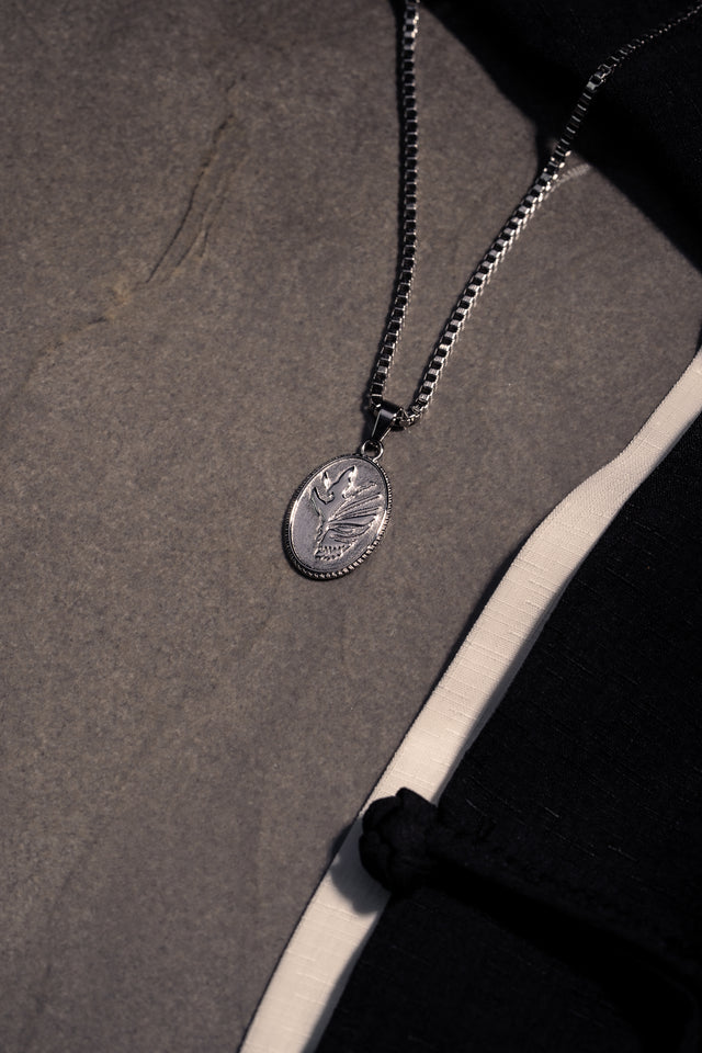 HOLLOW SKULL PENDANT