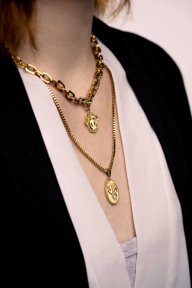 SKULL BADGE PENDANT
